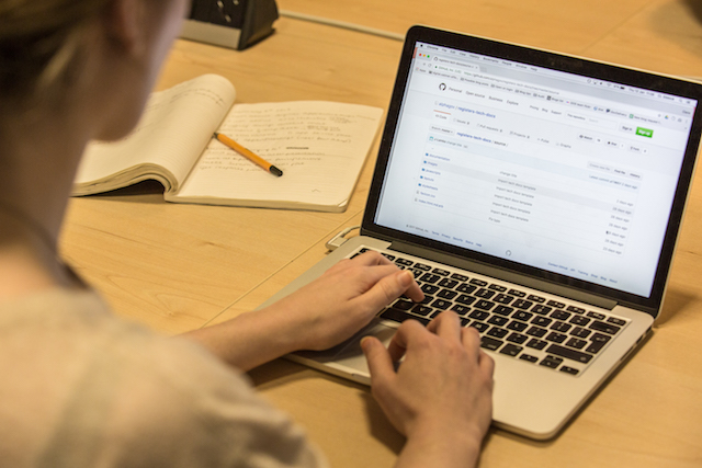 Person typing on computer