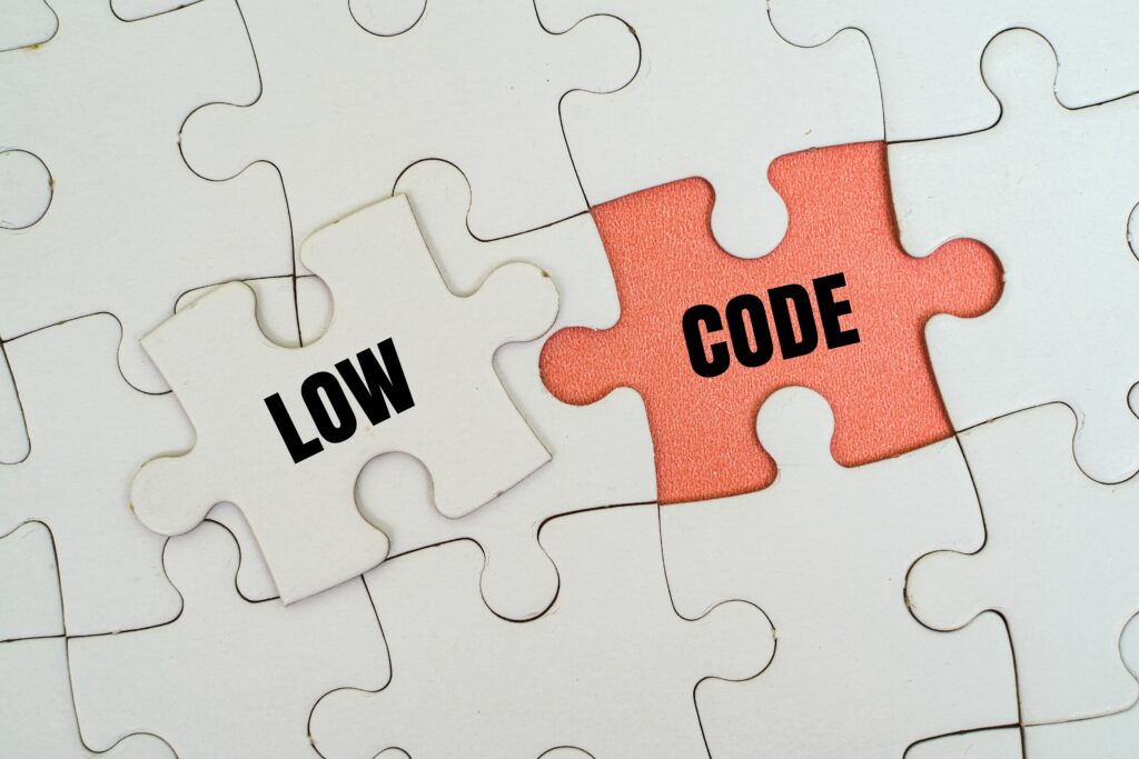 LOW CODE word alphabet letters on puzzle.